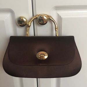 The cutest mini purse with a bamboo style handle